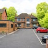Photo 2: Exterior and parking