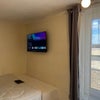 Photo 4: Wall-mounted TV Bedroom 2