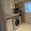 Photo 8: Lodgers' kitchenette with washing & drying machines