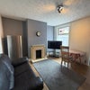 Photo 2: Clean modern lounge