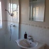 Photo 17: Bathroom is cleaned weekly by our cleaners and shared with only one other!