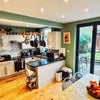 Photo 6: Large kitchen/diner with bifold doors leading to garden