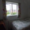 Photo 10: Single room showing window to the side of the house