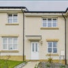 Photo 4: Outside view of house