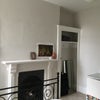 Photo 6: Room 2 original fireplace feature