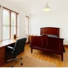 Photo 3: Main bedroom with a desk and director chair