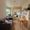 Photo 2: Kitchen and Living Area