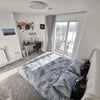 Photo 2: Spacious bedroom with dedicated study/work area