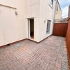 Photo 10: Back garden space via Bedroom 1