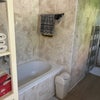 Photo 8: Bathroom with bath 