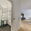 Photo 5: Bathroom/Hallway