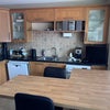 Photo 2: Shared kitchen and hanging out space