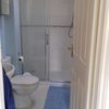 Photo 5: Shower and toilet