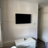Photo 3: Wall-mounted TV Bedroom 1
