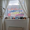 Photo 4: View from the room to the main road