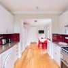 Photo 15: Communal Kitchen/Dining Area
