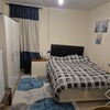 Photo 1: A double bed. Bedside drawer & lamp