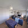 Photo 4: Shared living and dining area