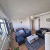 Photo 3: Large shared living room