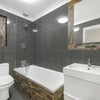 Photo 6: Shared bathroom with toilet