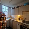 Photo 8: Old image so the shelf on the left is not longer present