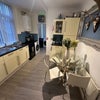 Photo 5: Communal Kitchen (Photo B)