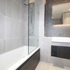 Photo 13: common bathroom