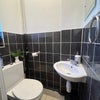 Photo 2: Loo with basin