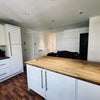 Photo 4: Kitchen + Living area