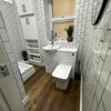 Photo 11: bathroom 1