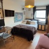 Photo 1: Bright, clean double bedroom with monitor, TV & fridge for chilled water and ices