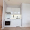 Photo 2: Kitchenette with Modern Appliances