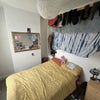 Photo 2: It has a suspended indoor clothes rack