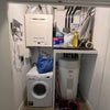 Photo 9: utility room with washing machine and boiler