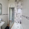 Photo 4: Bathroom view toward entry