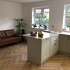 Photo 7: Shared kitchen with seated area