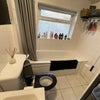 Photo 9: Bathroom with toilet, sink, mirrors, bath and shower