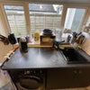 Photo 7: Kitchen with oven, microwave, washing machine, and countertop
