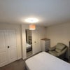Photo 3: Lower ground floor en-suite walk in wardrobe