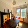 Photo 4: The kitchen and dining area in the morning sun.