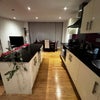 Photo 7: Fully functional kitchen and living space with a dinning area with the marina view