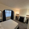 Photo 8: large room downstairs 