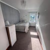 Photo 4: double upstairs bedroom with dining area and orchard views