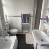 Photo 7: Upstairs bathroom with bathtub and shower