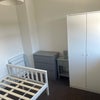 Photo 5: Mattress included without bedding. 