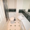 Photo 14: common bathroom