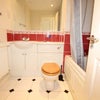 Photo 16: common bathroom