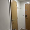 Photo 8: Entrance and toilet door