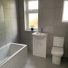 Photo 8: Bathroom upstairs