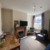 Photo 4: Shared living room 